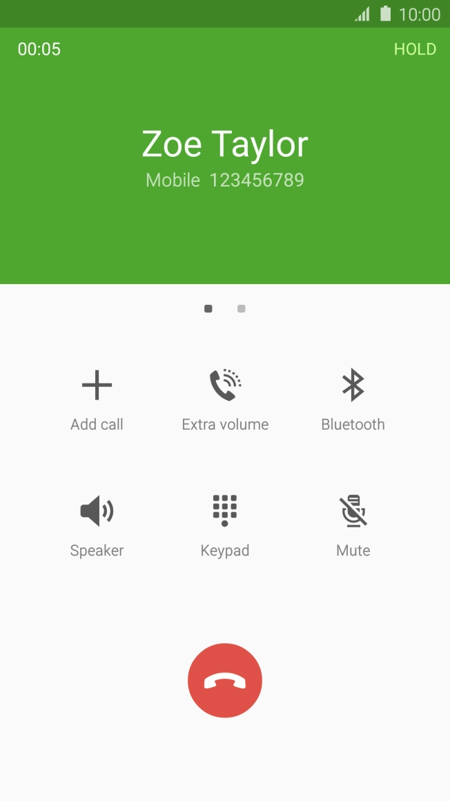 Press the end call icon.