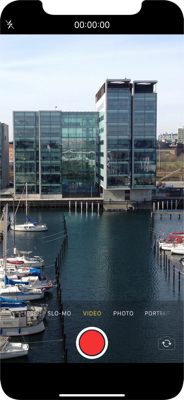 Slide your finger right or left on the screen to select PHOTO.