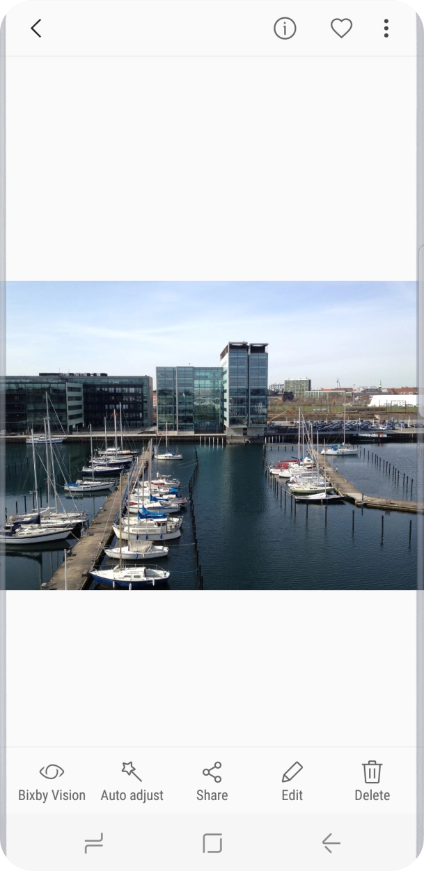 Press the Return key to return to the list of pictures and video clips.