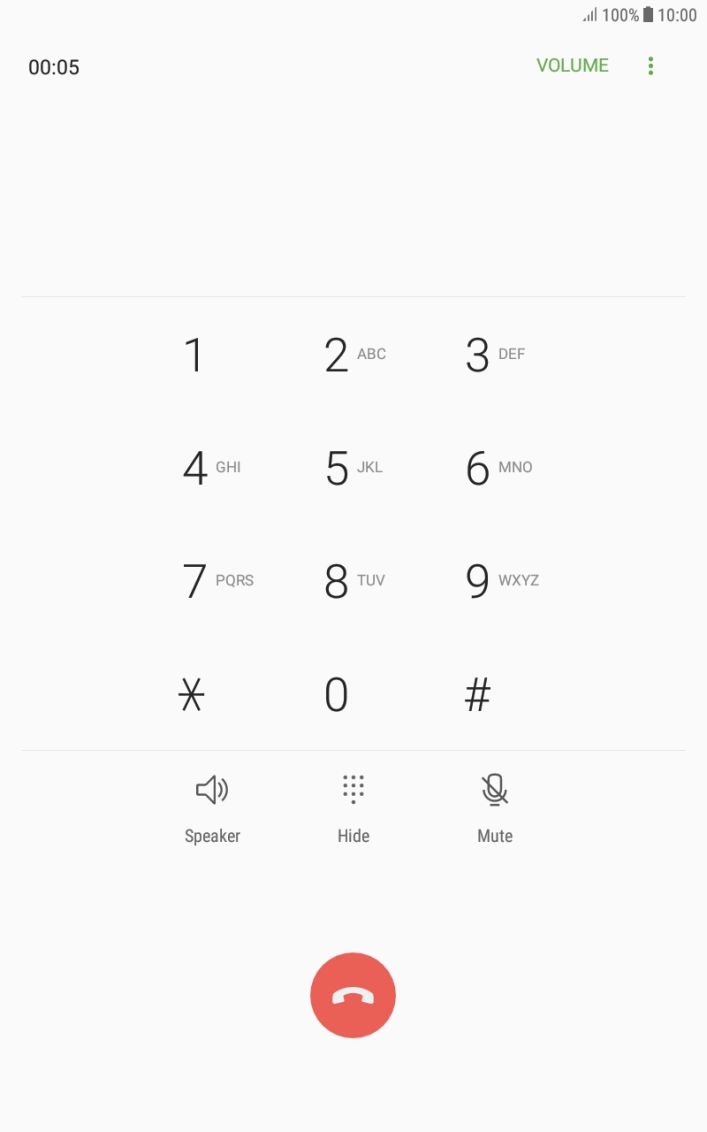 Press the end call icon.