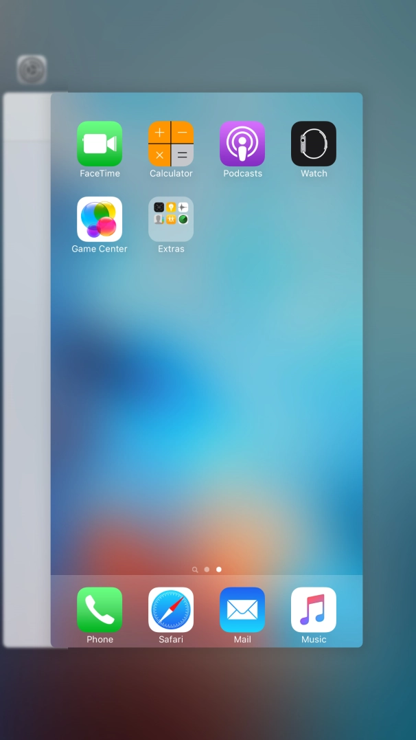 Slide the required application upwards to end it.