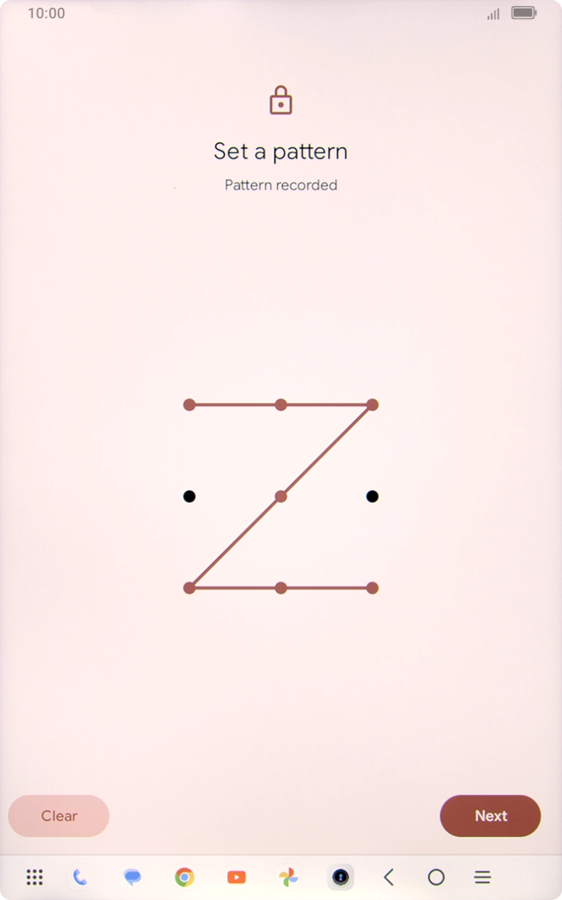 Slide your finger across the screen to connect at least four points and press Next.