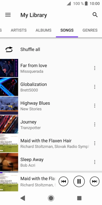Press the song title at the bottom of the screen.