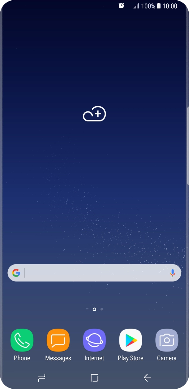 The alarm icon shows that the alarm is set.
