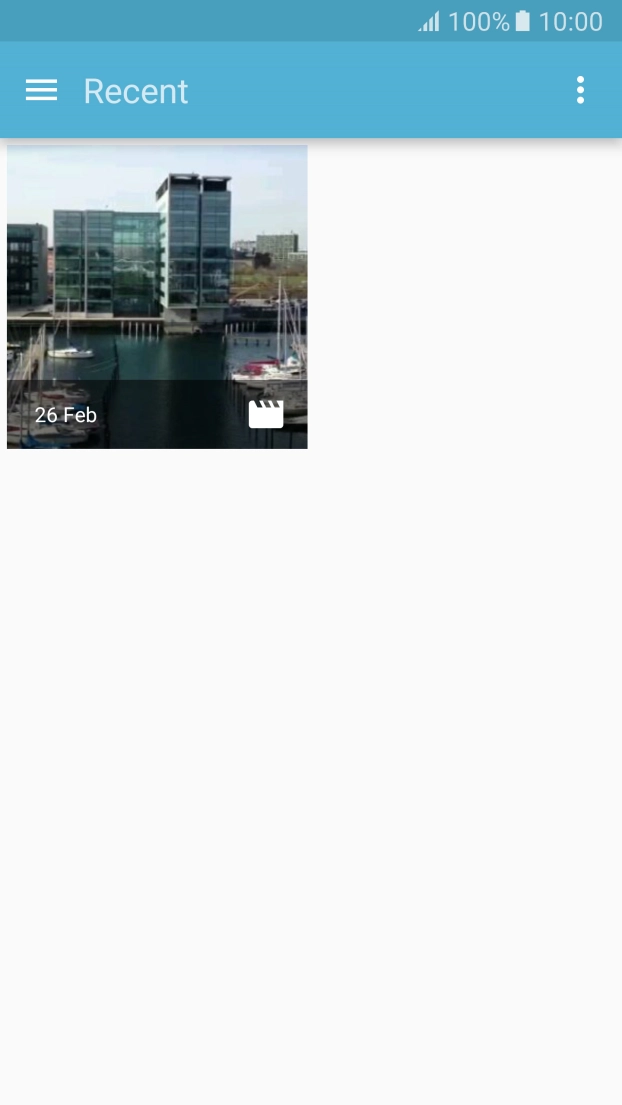 Slide your finger right starting from the left side of the screen.