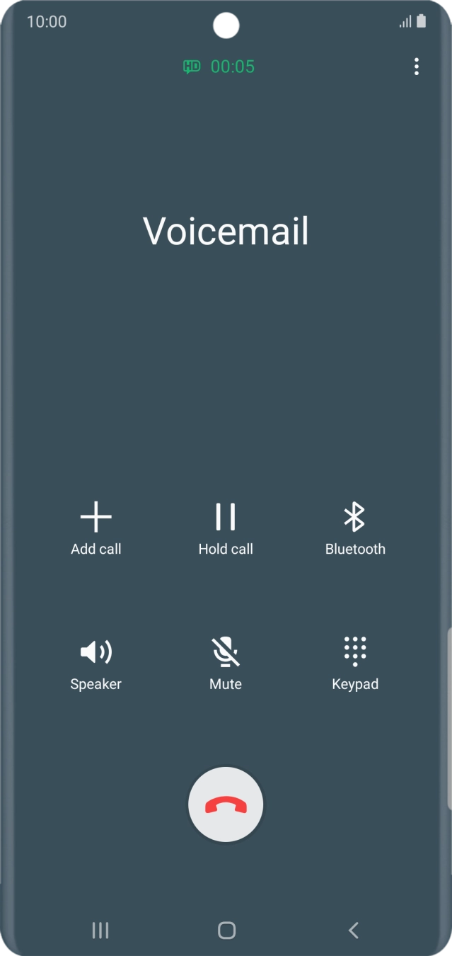 Press the end call icon.
