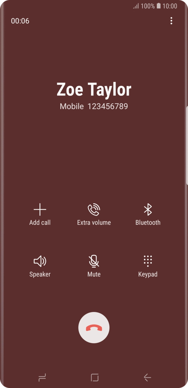 Press the end call icon.