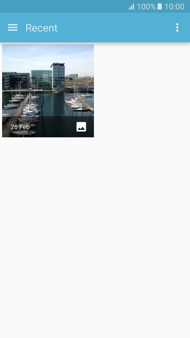 Slide your finger right starting from the left side of the screen.