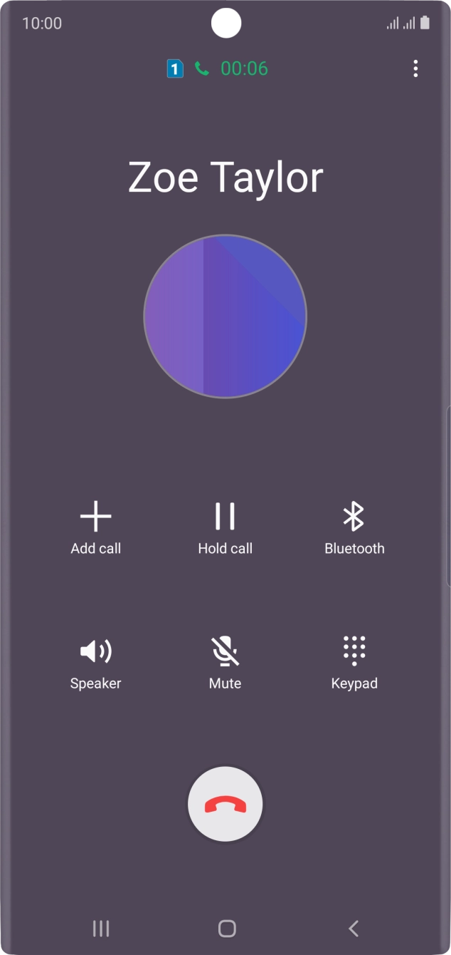 Press the end call icon.