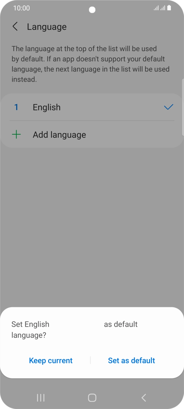 To select the new language as the default phone language, press Set as default.