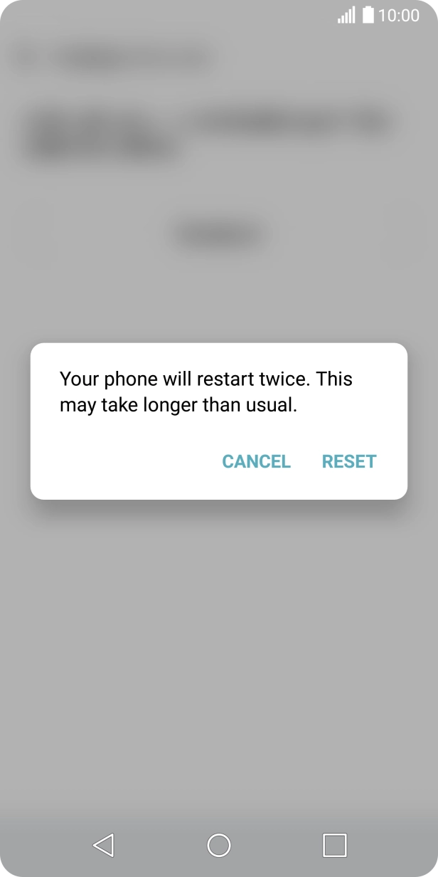 Press RESET. Wait a moment while the factory default settings are restored. 
Follow the instructions on the screen to set up your phone and prepare it for use.