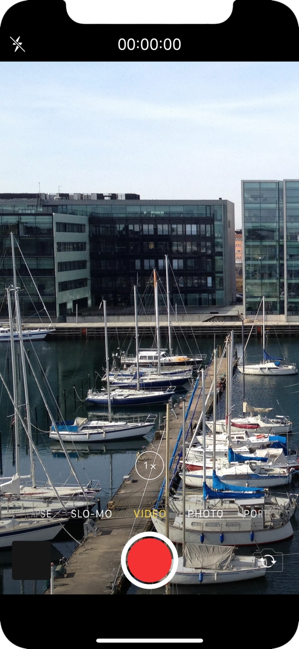 Slide your finger right or left on the screen to select PHOTO.