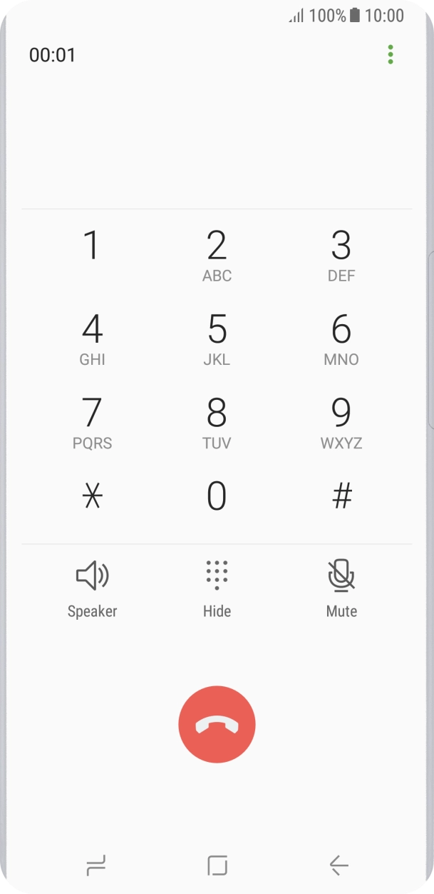 Press the end call icon.