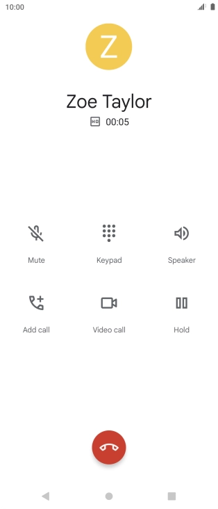 Press the end call icon.