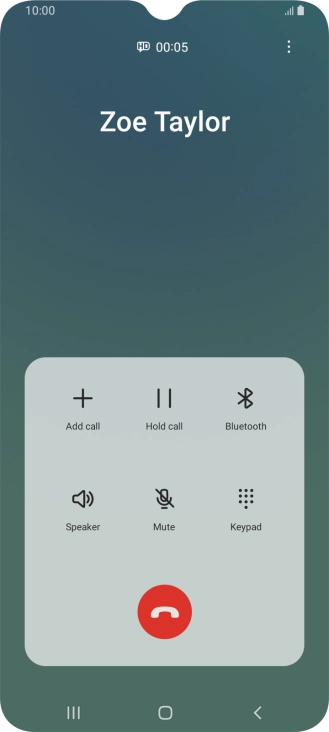 Press the end call icon.