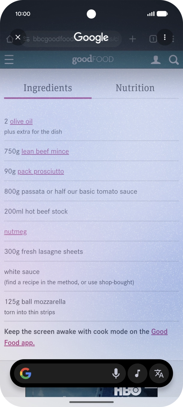 Prima o ícone de traduzir.