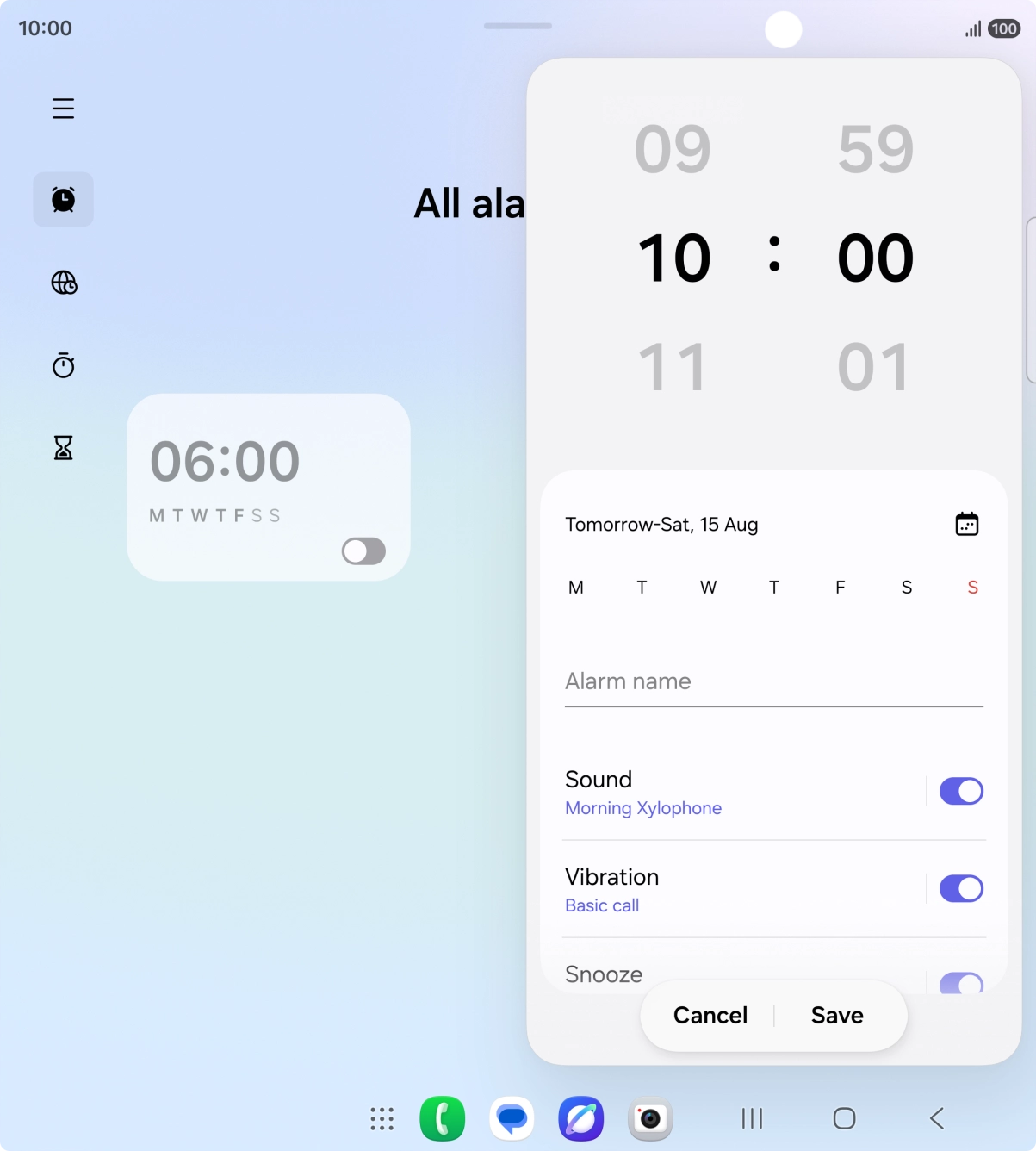 Slide your finger up or down on the hour and minute numbers to set the required alarm time.
