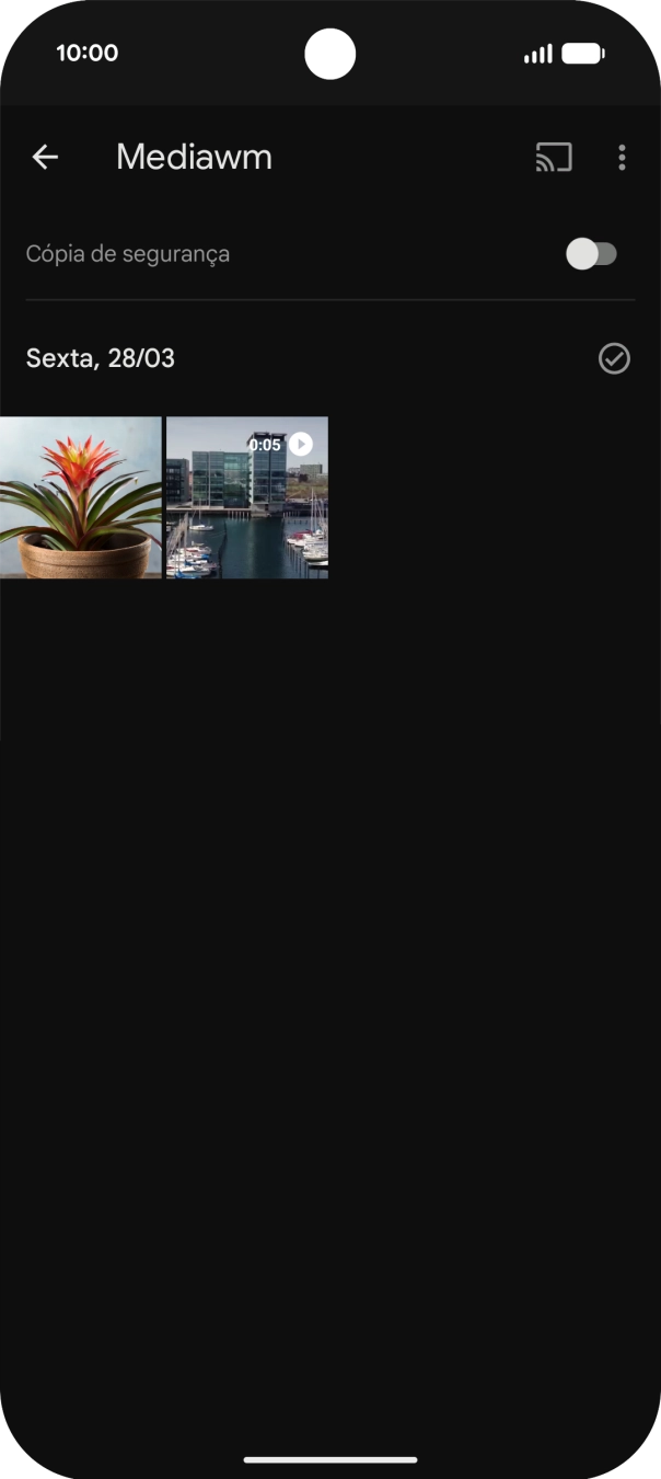 Prima durante um momento a imagem ou o vídeo pretendido.