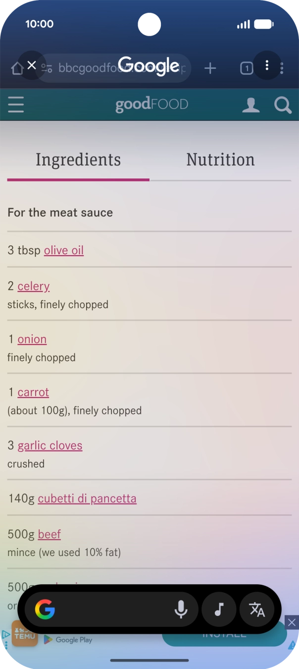 Prima o ícone de traduzir.