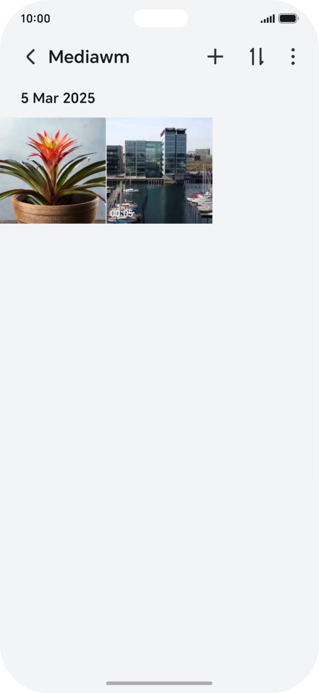 Press and hold any picture or video.