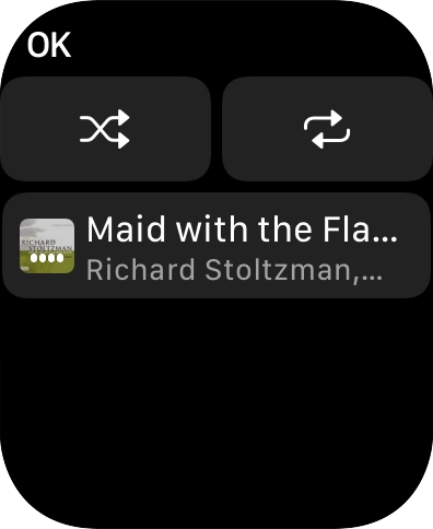 Prima o ícone de reprodução aleatória.