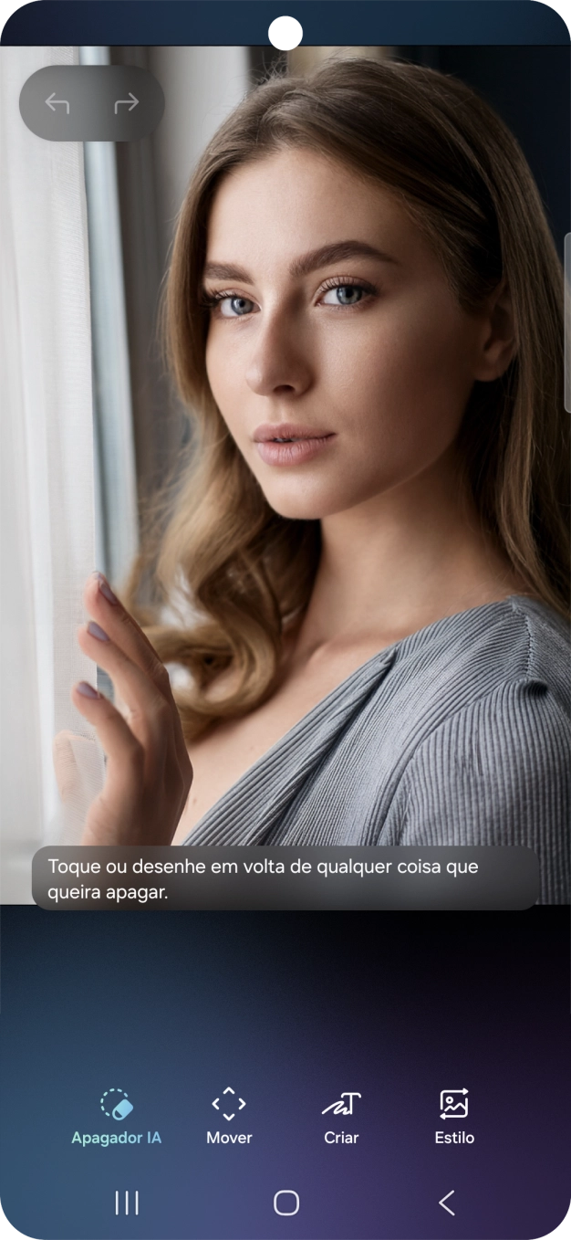 Para apagar objetos na sua imagem, prima Apagador IA e siga as indicações no ecrã, para utilizar a função.