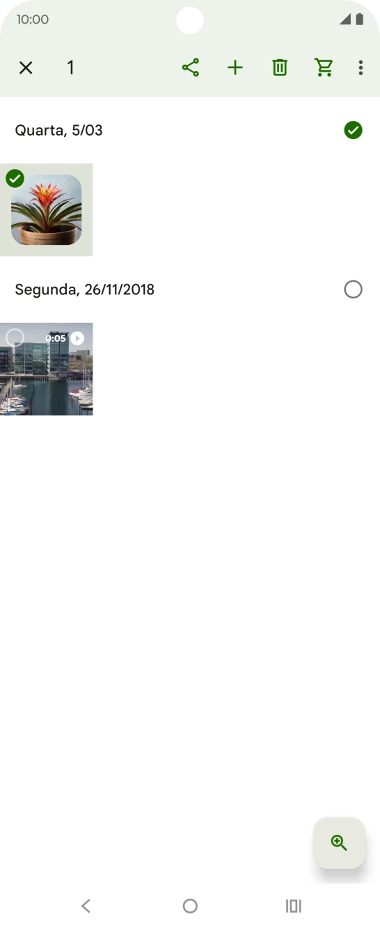 Prima as imagens ou vídeos pretendidos para os escolher.