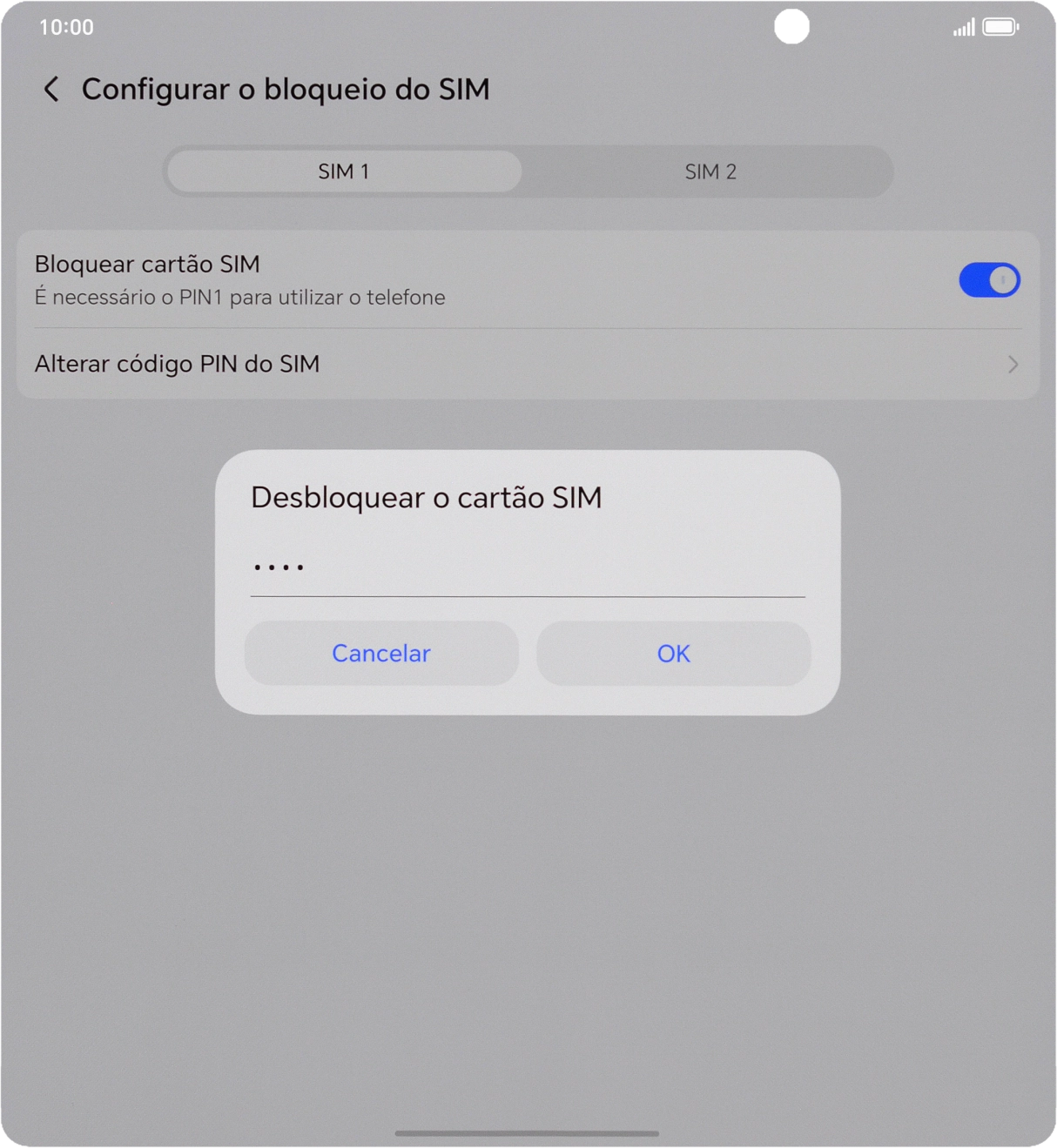 Introduza o seu código PIN e prima OK.