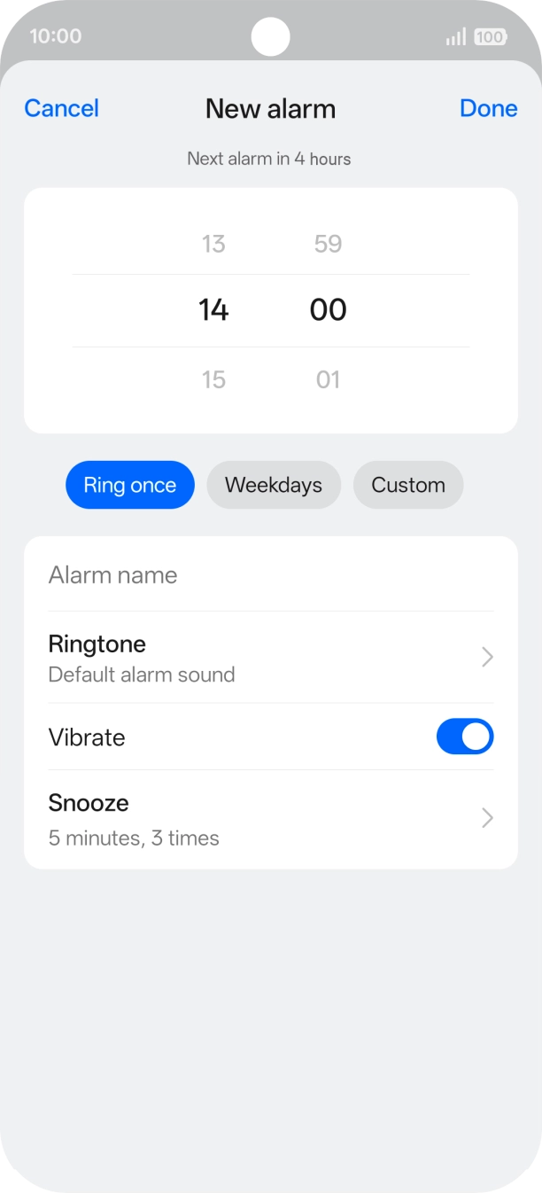 Slide your finger up or down on the hour and minute numbers to set the required alarm time.