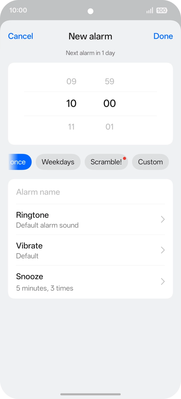 Slide your finger up or down on the hour and minute numbers to set the required alarm time.