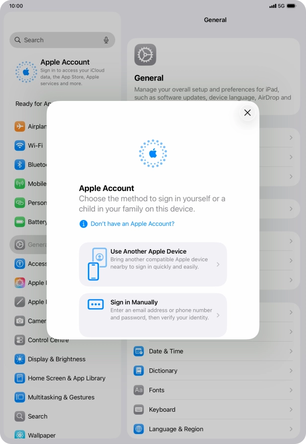 Press Sign in Manually. Press Sign in Manually.