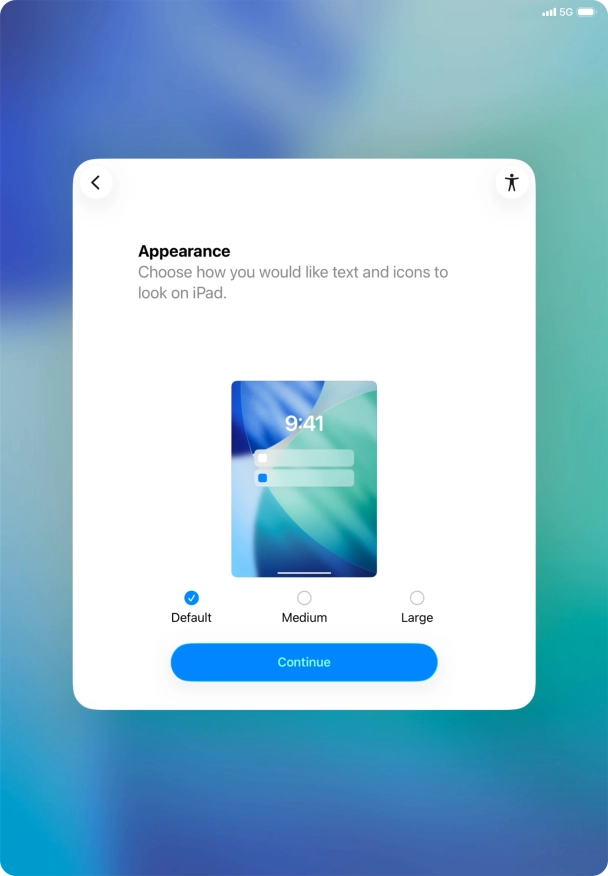 Select the required text and icon size on your tablet and press Continue.