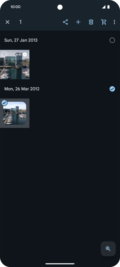 Press the required pictures or videos to select them.