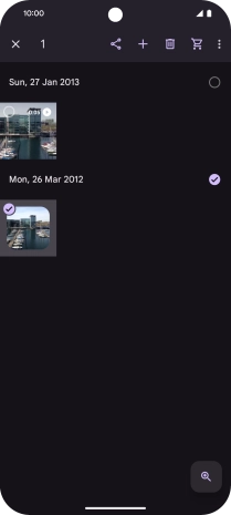 Press the required pictures or videos to select them.