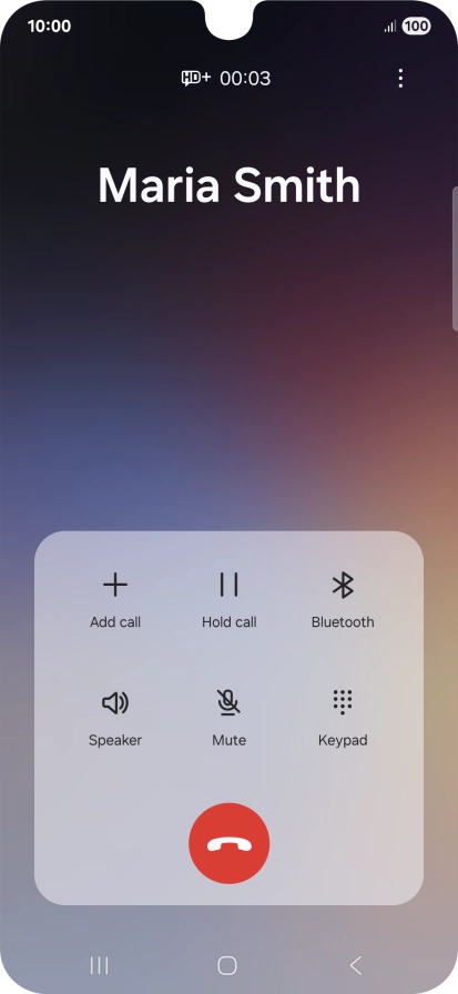 Press the end call icon.