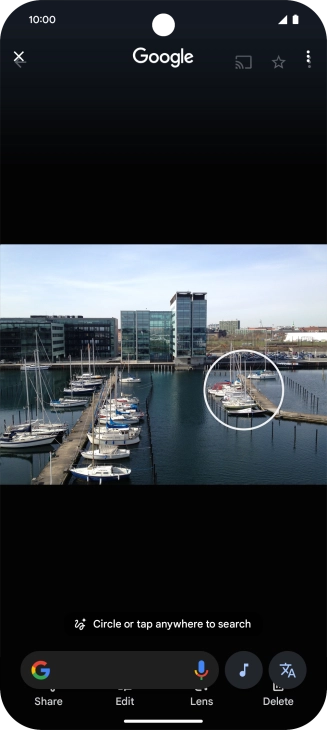 Draw a circle around the required object on the picture and wait for the search results.