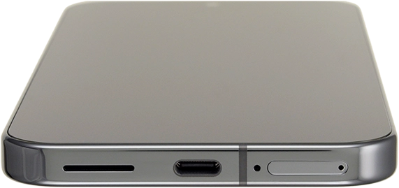 Insert the opener into the small hole in the SIM holder.