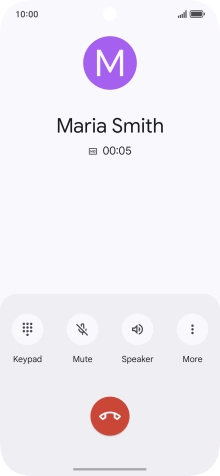 Press the end call icon.
