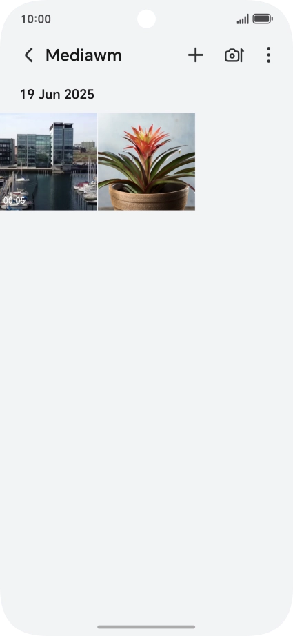 Press and hold any picture or video.