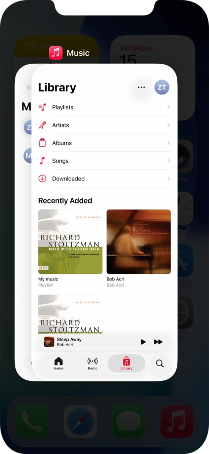Slide upwards on the required application to end it.