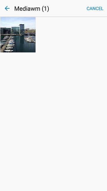 Go to the required folder.Press the required picture.