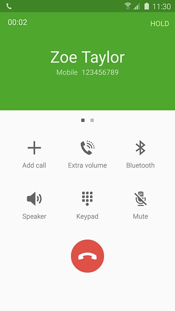 Press the end call icon.