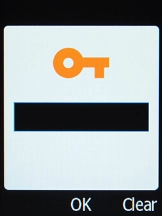 Key in +447785016005 and press the OK key.