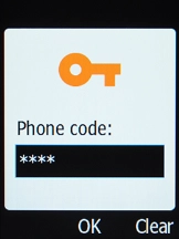 Key in the phone lock code and press the OK key.