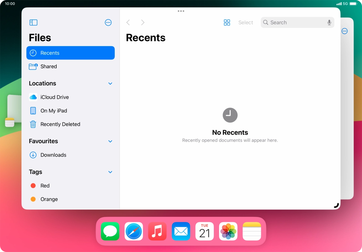 Press the required application in Dock and drag it to the required location on the screen.