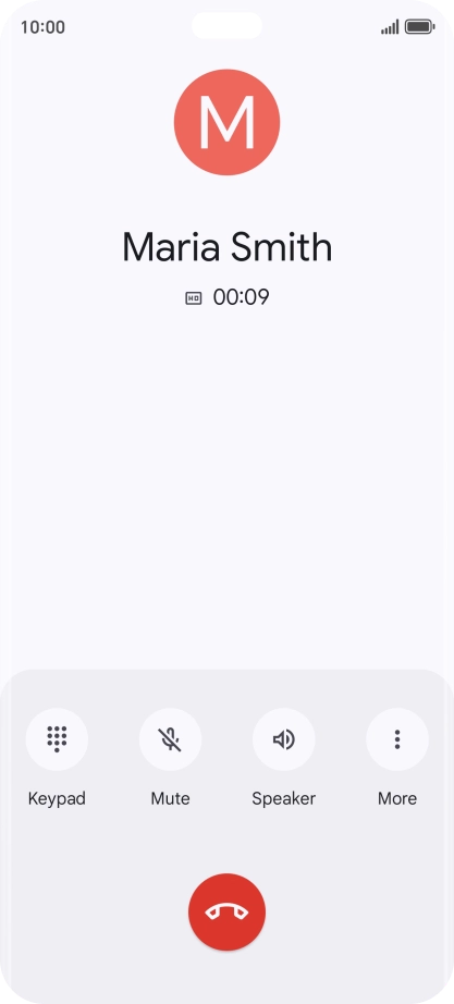 Press the end call icon.