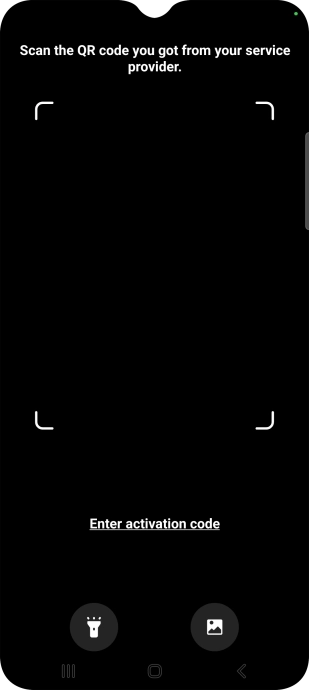 Place the QR code you've received inside the phone camera frame to scan the code. Your eSIM is transferred to your new phone over the internet.