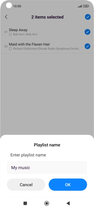 Key in a name for the playlist and press OK. Key in a name for the playlist and press OK.