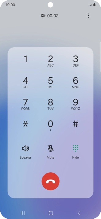 Press the end call icon.