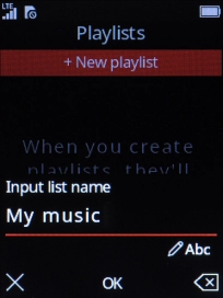 Key in a name for the playlist and press the Navigation key.